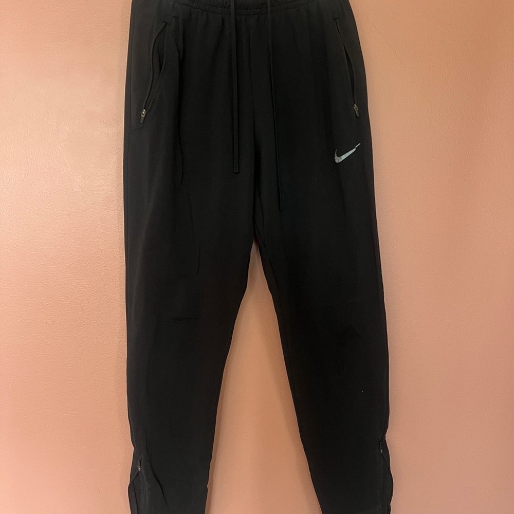 Nike Men's Dry Fit Black Jogger Pants. Size M. Zipper at the ankle.